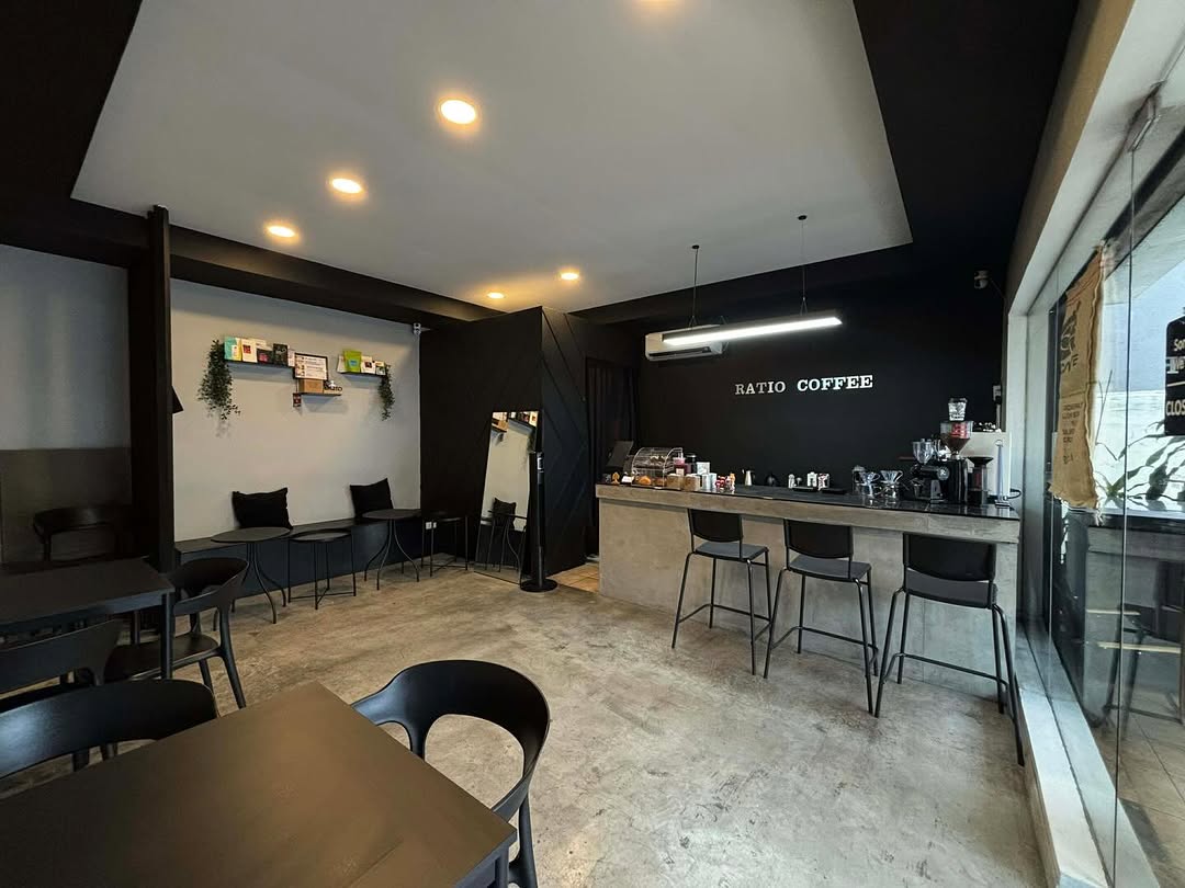 Ratio Coffee current cafe interior — concrete floor and espresso bar